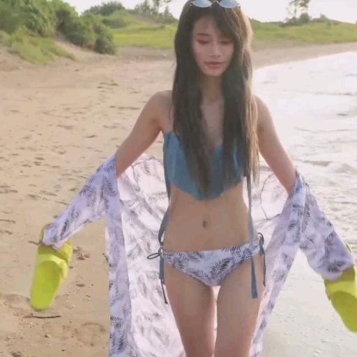 少妇沙滩露出诱惑